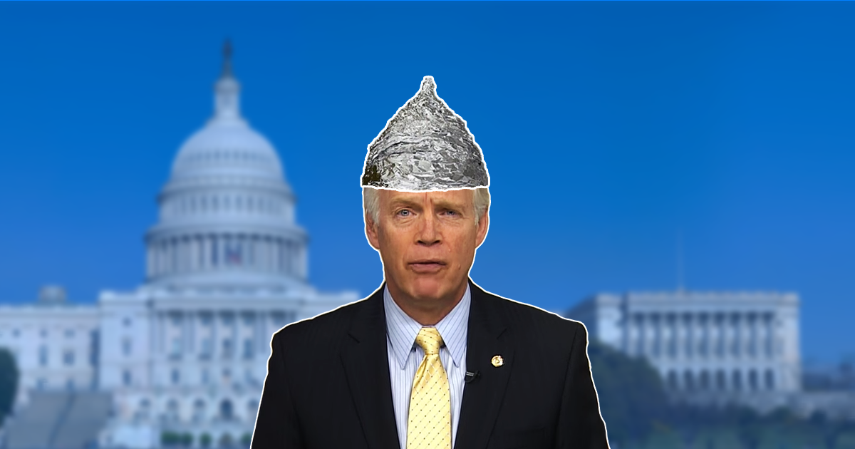 ron johnson wearing a tin foil hat in front of u.s. capitol